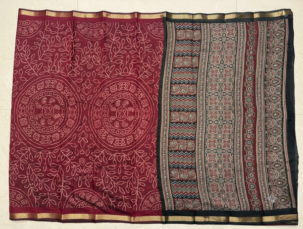 Maroon Bhandhini printed Liva saree with zari border