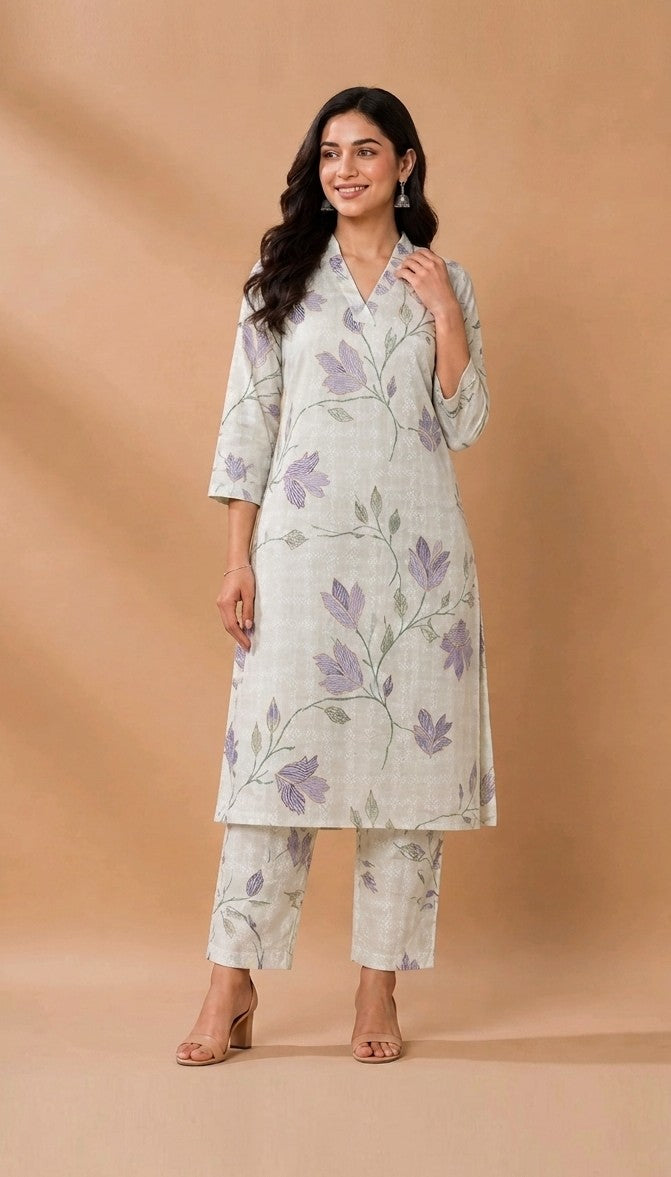 Woman wearing a floral outfit on a beige background