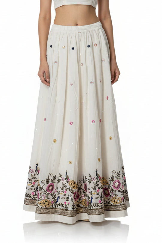 White dress with floral embroidery on a white background