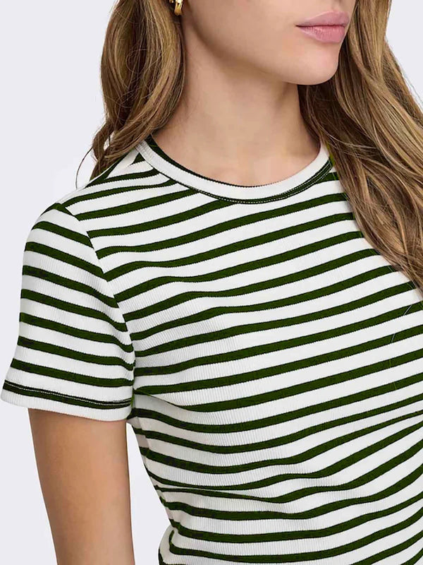 Green and white striped shirt worn by a person on a plain background