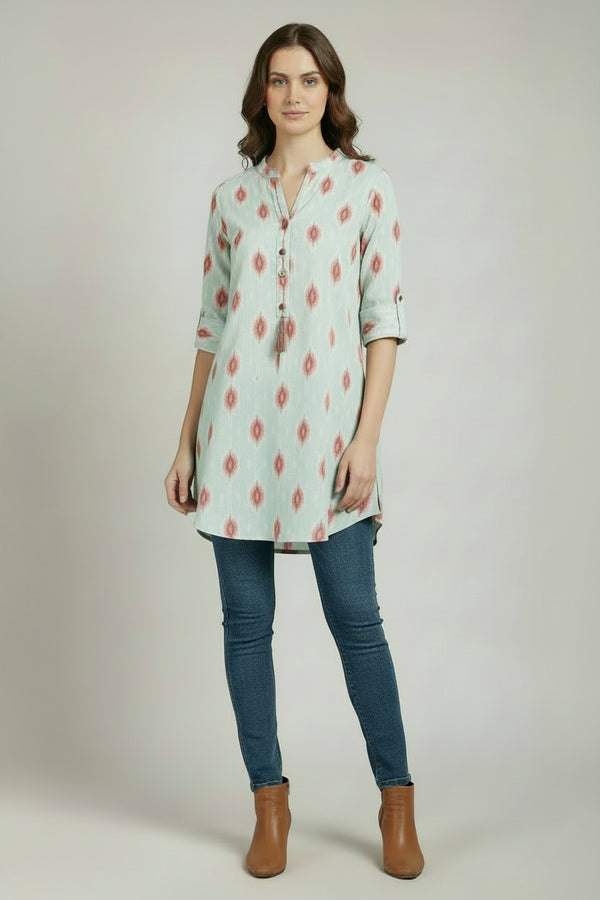 Light blue shirt with red diamond pattern on a white background
