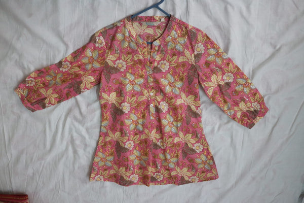 Floral-patterned shirt on a white background