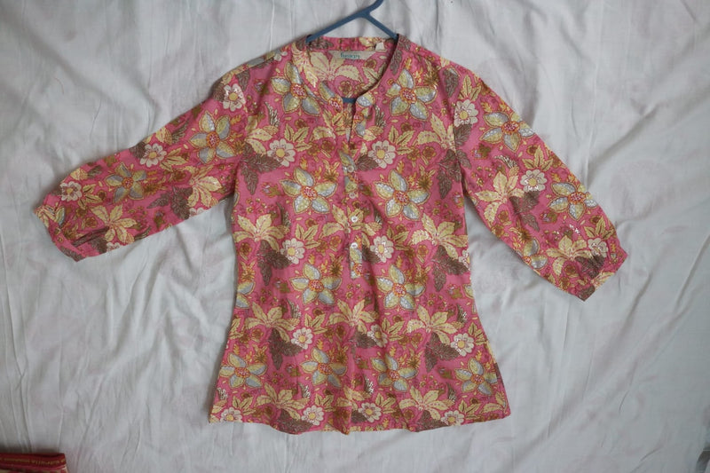Floral-patterned shirt on a white background