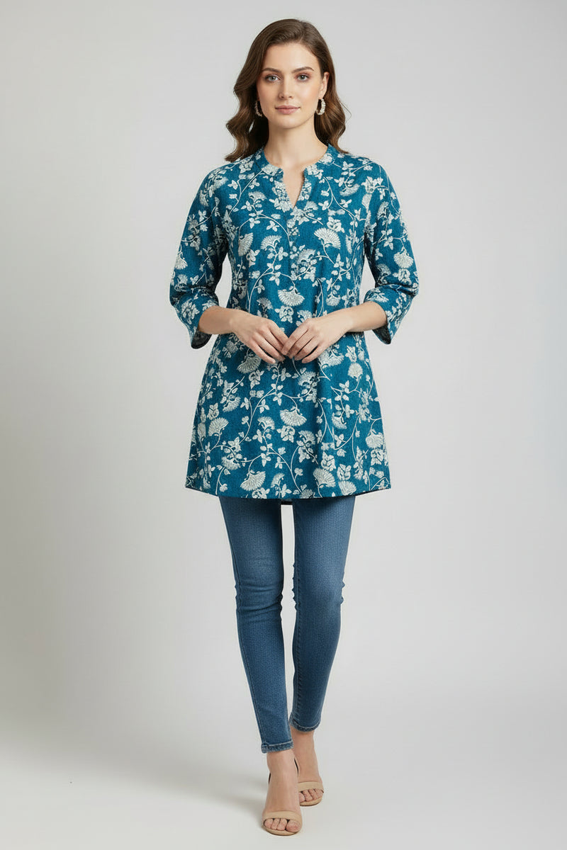 Blue floral patterned shirt on a white background