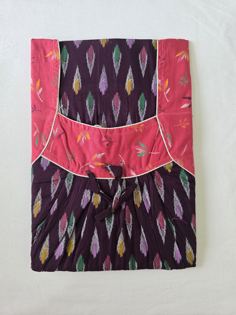 Purple fabric with colorful feather pattern on a white background