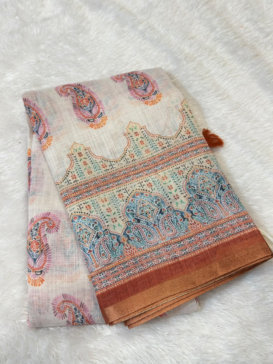 White and Saffron Printed Linen saree with Zari border