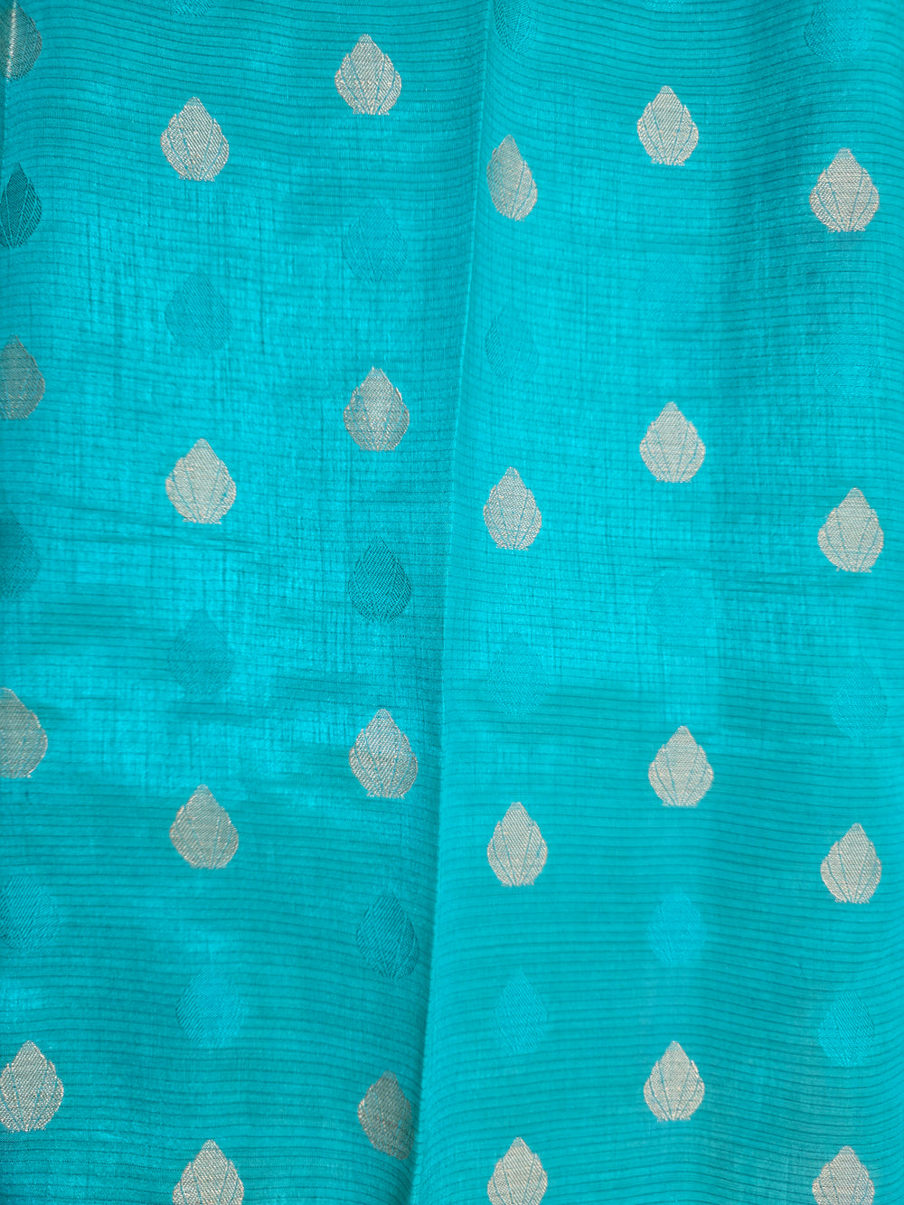 Turquoise Blue Semi Silk Saree featuring Silver Zari Weaving & Rich Zari Pallu