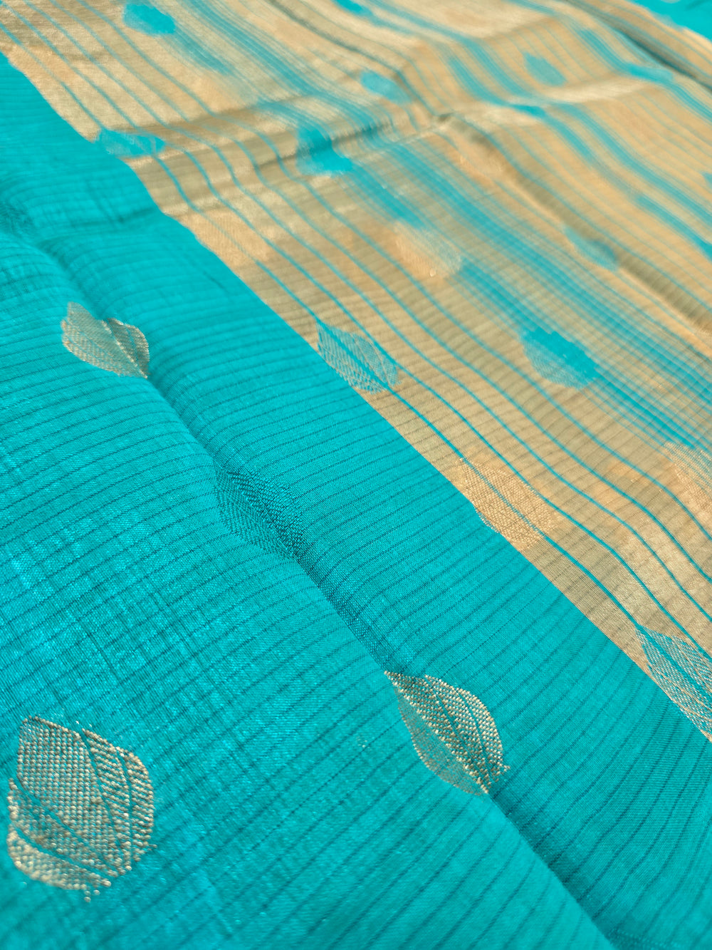 Turquoise Blue Semi Silk Saree featuring Silver Zari Weaving & Rich Zari Pallu